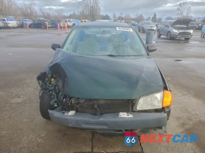 Piąte zdjęcie samochodu w środku: 2000 MAZDA PROTEGE DX VIN:JM1BJ2225Y0218642 - miniatura
