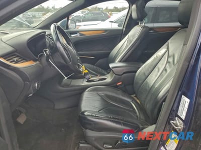 Zdjęcie 7 z 14 samochodu: 2015 LINCOLN MKC VIN:5LMTJ2AH5FUJ10241 - miniatura