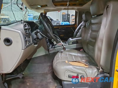 Zdjęcie 7 z 14 samochodu: 2003 HUMMER H2 VIN:5GRGN23UX3H144072 - miniatura