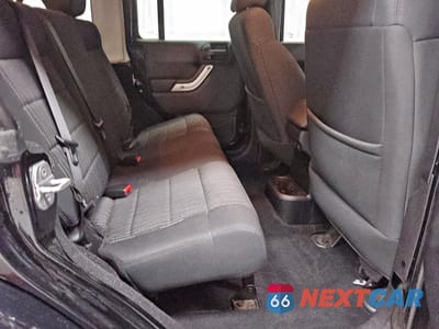 Zdjęcie 10 z 13 samochodu: 2012 JEEP WRANGLER UNLIMITED SAHARA VIN:1C4HJWEG7CL113939 - miniatura