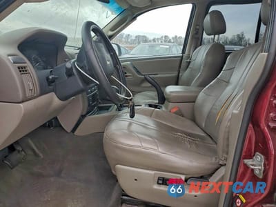 Zdjęcie 7 z 13 samochodu: 2003 JEEP GRAND CHEROKEE LAREDO VIN:1J8GW48S93C556717 - miniatura