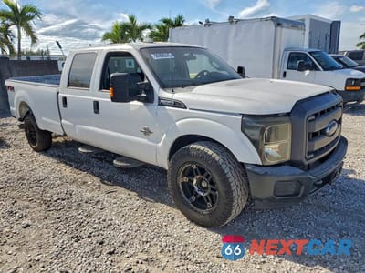 Czwarte zdjęcie samochodu z boku: 2014 FORD F350 SUPER DUTY VIN:1FT8W3AT7EEA98238 - miniatura