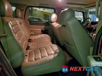 Zdjęcie 11 z 14 samochodu: 2003 HUMMER H2 VIN:5GRGN23U23H144695 - miniatura