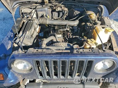 Zdjęcie 12 z 14 samochodu: 2002 JEEP WRANGLER / TJ X VIN:1J4FA39S32P775538 - miniatura