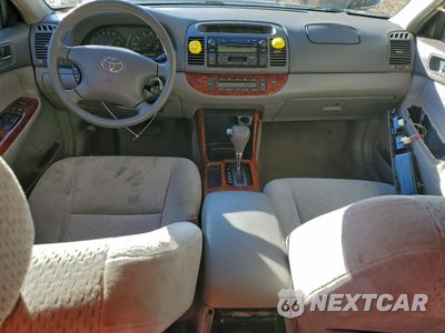 Zdjęcie 8 z 14 samochodu: 2003 TOYOTA CAMRY LE VIN:4T1BE30K33U212171 - miniatura