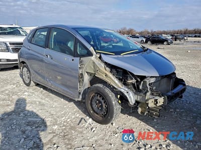 Czwarte zdjęcie samochodu z boku: 2020 HONDA FIT LX VIN:3HGGK5H46LM702582 - miniatura