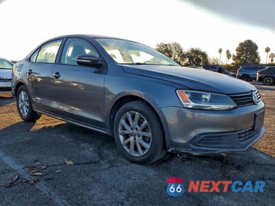 Czwarte zdjęcie samochodu z boku: 2012 VOLKSWAGEN JETTA SE VIN:3VWDP7AJ3CM322756 - miniatura