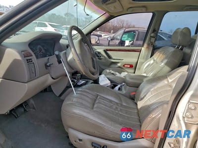 Zdjęcie 7 z 12 samochodu: 2000 JEEP GRAND CHEROKEE LIMITED VIN:1J4GW58N6YC227501 - miniatura