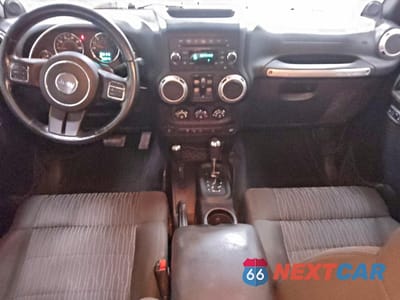 Zdjęcie 8 z 13 samochodu: 2012 JEEP WRANGLER UNLIMITED SAHARA VIN:1C4HJWEG7CL113939 - miniatura