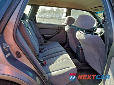 Zdjęcie 10 z 12 samochodu: 1996 TOYOTA CAMRY LE VIN:4T1EF12K5TU125643 - miniatura