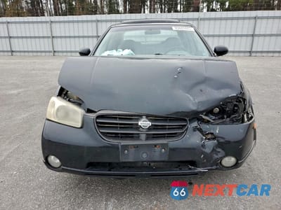 Piąte zdjęcie samochodu w środku: 2000 NISSAN MAXIMA GLE VIN:JN1CA31A6YT028448 - miniatura