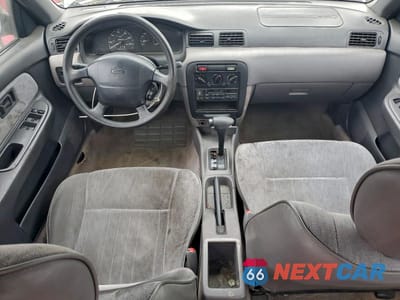 Zdjęcie 8 z 12 samochodu: 1995 NISSAN SENTRA BASE VIN:1N4AB41D1SC760369 - miniatura