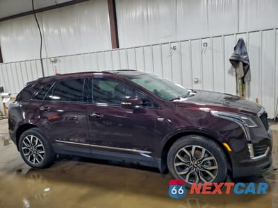 Czwarte zdjęcie samochodu z boku: 2021 CADILLAC XT5 SPORT VIN:1GYKNGRSXMZ131701 - miniatura