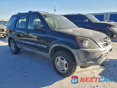 Czwarte zdjęcie samochodu z boku: 2002 HONDA CR-V LX VIN:JHLRD68412C016959 - miniatura