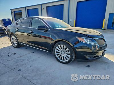Czwarte zdjęcie samochodu z boku: 2014 LINCOLN MKS VIN:1LNHL9DKXEG610007 - miniatura