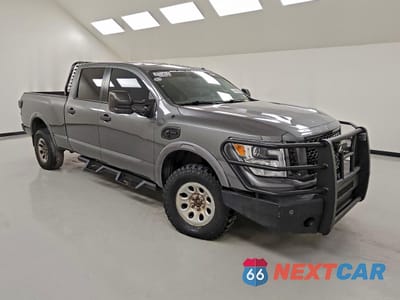 Czwarte zdjęcie samochodu z boku: 2019 NISSAN TITAN XD SL VIN:1N6BA1F43KN521013 - miniatura