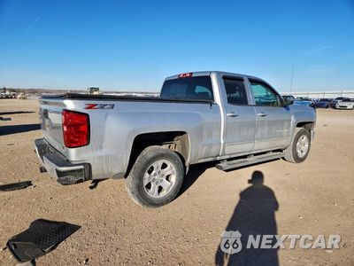 Trzecie zdjęcie samochodu z tyłu: 2018 CHEVROLET SILVERADO K1500 LT VIN:2GCVKREC4J1104679 - miniatura