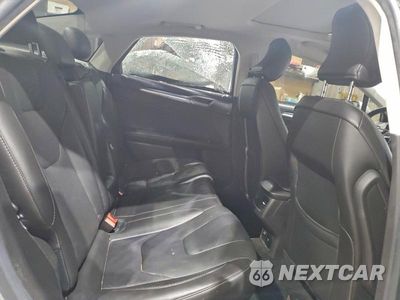 Zdjęcie 10 z 11 samochodu: 2016 FORD FUSION TITANIUM HEV VIN:3FA6P0RUXGR357732 - miniatura