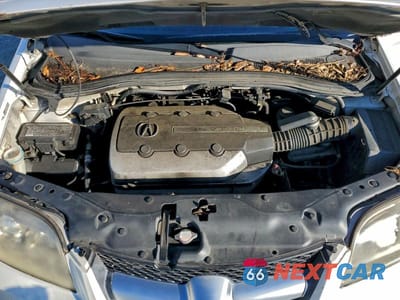 Zdjęcie 12 z 12 samochodu: 2006 ACURA MDX TOURING VIN:2HNYD18716H546688 - miniatura