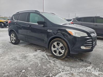 Czwarte zdjęcie samochodu z boku: 2016 FORD ESCAPE SE VIN:1FMCU9G97GUB17356 - miniatura