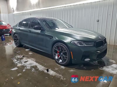 Czwarte zdjęcie samochodu z boku: 2023 BMW M5 VIN:WBS83CH09PCL44962 - miniatura