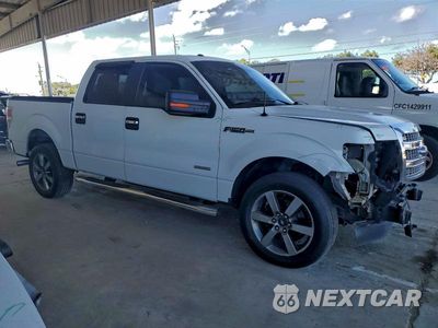 Czwarte zdjęcie samochodu z boku: 2014 FORD F150 SUPERCREW VIN:1FTFW1CT2EKF36447 - miniatura
