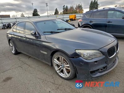 Czwarte zdjęcie samochodu z boku: 2012 BMW 750 I VIN:WBAKA8C50CCY37455 - miniatura