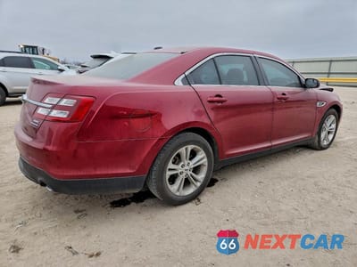 Trzecie zdjęcie samochodu z tyłu: 2016 FORD TAURUS SEL VIN:1FAHP2E80GG141313 - miniatura