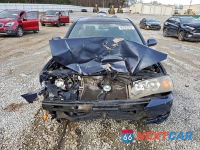 Piąte zdjęcie samochodu w środku: 2005 HYUNDAI ELANTRA GLS VIN:KMHDN46D05U031569 - miniatura