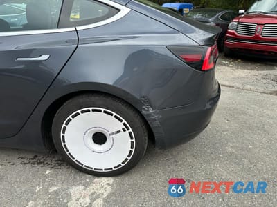 Zdjęcie 11 z 13 samochodu: 2018 TESLA MODEL 3 VIN:5YJ3E1EB1JF119421 - miniatura