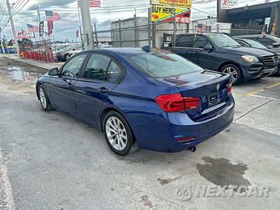 Trzecie zdjęcie samochodu z tyłu: 2018 BMW 320 I VIN:WBA8E1G50JNU91361 - miniatura