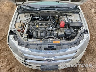 Zdjęcie 11 z 14 samochodu: 2012 FORD FUSION S VIN:3FAHP0GA5CR437905 - miniatura