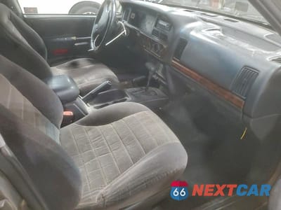 Zdjęcie 7 z 12 samochodu: 1998 JEEP GRAND CHEROKEE LAREDO VIN:1J4GZ58S1WC237685 - miniatura