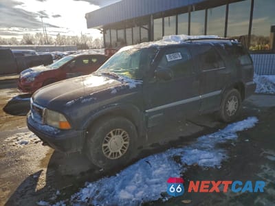 1999 GMC JIMMY 1GKDT13WXX2558102 - główne zdjęcie licytacji z USA - miniatura