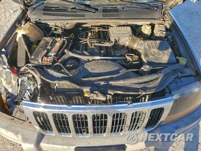Zdjęcie 12 z 14 samochodu: 2000 JEEP GRAND CHEROKEE LAREDO VIN:1J4G248S0YC367975 - miniatura