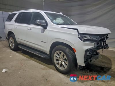 Czwarte zdjęcie samochodu z boku: 2023 CHEVROLET TAHOE K1500 PREMIER VIN:1GNSKSKD6PR469508 - miniatura