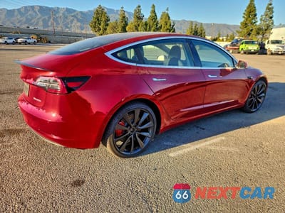 Trzecie zdjęcie samochodu z tyłu: 2020 TESLA MODEL 3 VIN:5YJ3E1EC0LF641100 - miniatura