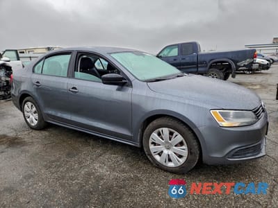 Czwarte zdjęcie samochodu z boku: 2011 VOLKSWAGEN JETTA BASE VIN:3VW2K7AJ6BM391039 - miniatura