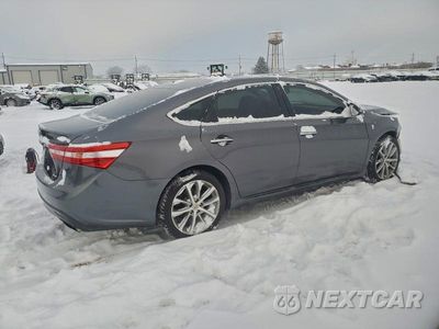 Trzecie zdjęcie samochodu z tyłu: 2014 TOYOTA AVALON BASE VIN:4T1BK1EB0EU131184 - miniatura
