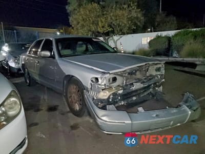 Czwarte zdjęcie samochodu z boku: 2011 MERCURY GRAND MARQUIS LS VIN:2MEBM7FV0BX601565 - miniatura