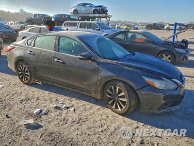 Czwarte zdjęcie samochodu z boku: 2018 NISSAN ALTIMA 2.5 VIN:1N4AL3APXJC204903 - miniatura