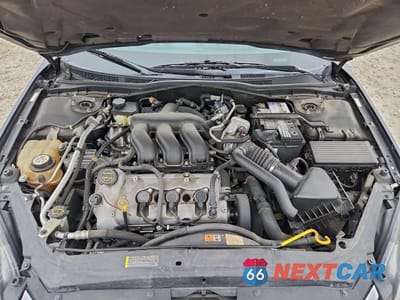 Zdjęcie 11 z 14 samochodu: 2006 FORD FUSION SE VIN:3FAFP07186R193680 - miniatura