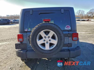 Zdjęcie 6 z 12 samochodu: 2015 JEEP WRANGLER UNLIMITED SPORT VIN:1C4BJWDG2FL622509 - miniatura