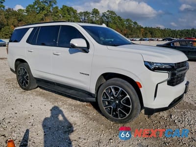 Czwarte zdjęcie samochodu z boku: 2023 CHEVROLET TAHOE C1500 RST VIN:1GNSCRKD3PR375527 - miniatura