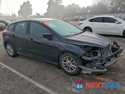 Czwarte zdjęcie samochodu z boku: 2018 FORD FOCUS SE VIN:1FADP3K23JL295324 - miniatura