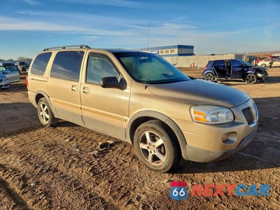 Czwarte zdjęcie samochodu z boku: 2005 PONTIAC MONTANA SV6 VIN:1GMDV33L25D183665 - miniatura