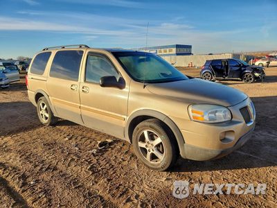 Czwarte zdjęcie samochodu z boku: 2005 PONTIAC MONTANA SV6 VIN:1GMDV33L25D183665 - miniatura