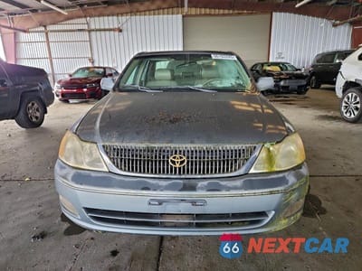 Piąte zdjęcie samochodu w środku: 2001 TOYOTA AVALON VIN:4T1BF28BXYU066631 - miniatura