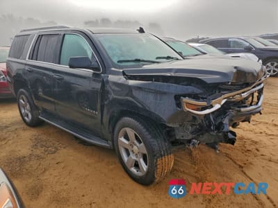 Czwarte zdjęcie samochodu z boku: 2019 CHEVROLET TAHOE C1500 LT VIN:1GNSCBKC0KR226872 - miniatura