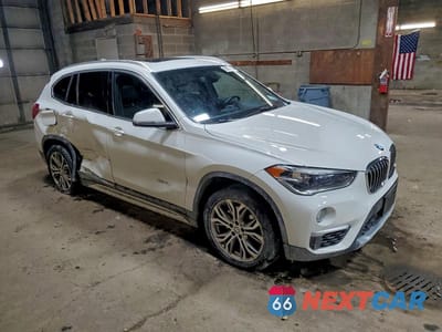 Czwarte zdjęcie samochodu z boku: 2016 BMW X1 XDRIVE28I VIN:WBXHT3Z31G4A49029 - miniatura